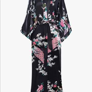 Satin like robe. Bought in Toronto. Would fit you to XL